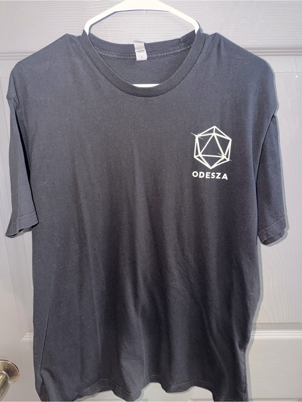 Next Level Apparel Black Tee with White ODESZA Geometric Logo